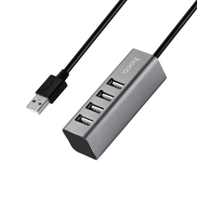 HOCO HB1 USB hub with 4 USB ports connected to laptop