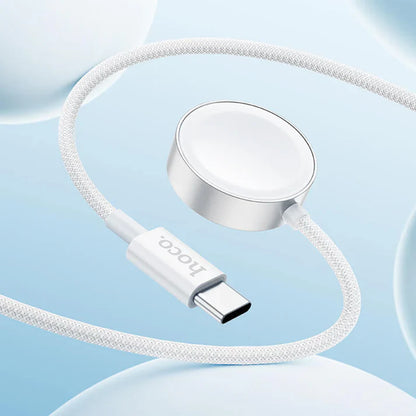 HOCO CW59 charging Apple Watch on magnetic pad
