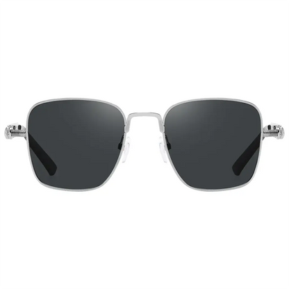 Green Lion Sentina sunglasses worn outdoors in sunlight
