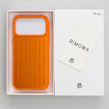 Grooved aluminium iPhone case - held in hand for scale