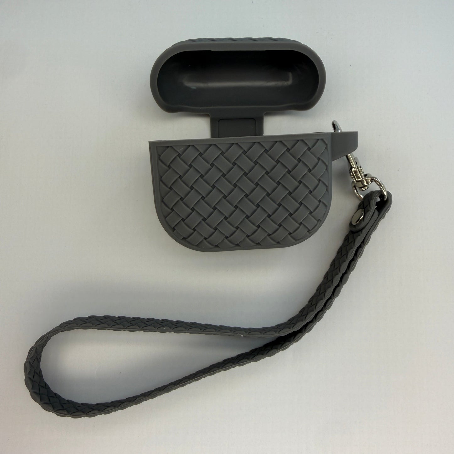 Purple Binkson rubber case for AirPods 4 with stylish braided texture design.
