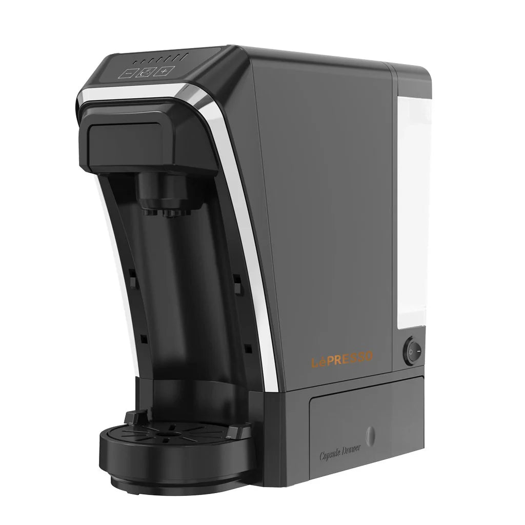 Lepresso capsule coffee maker with auto ejection system in black, front view showing brew button and water tank
