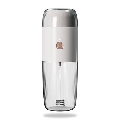 LePresso 2-in-1 portable coffee grinder and milk frother in white, showing grinder top and frother handle
