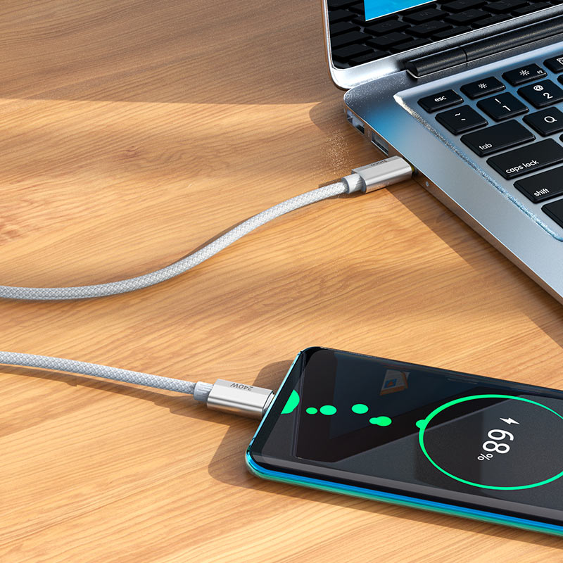 Hoco U134 240W PD3.1 cable charging a laptop at full 48V 5A power output via USB-C port
