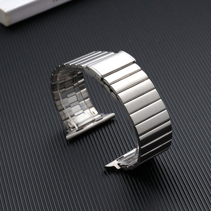 Spigen Modern Fit fold-over metal clasp detail showing secure lock mechanism in silver stainless steel
